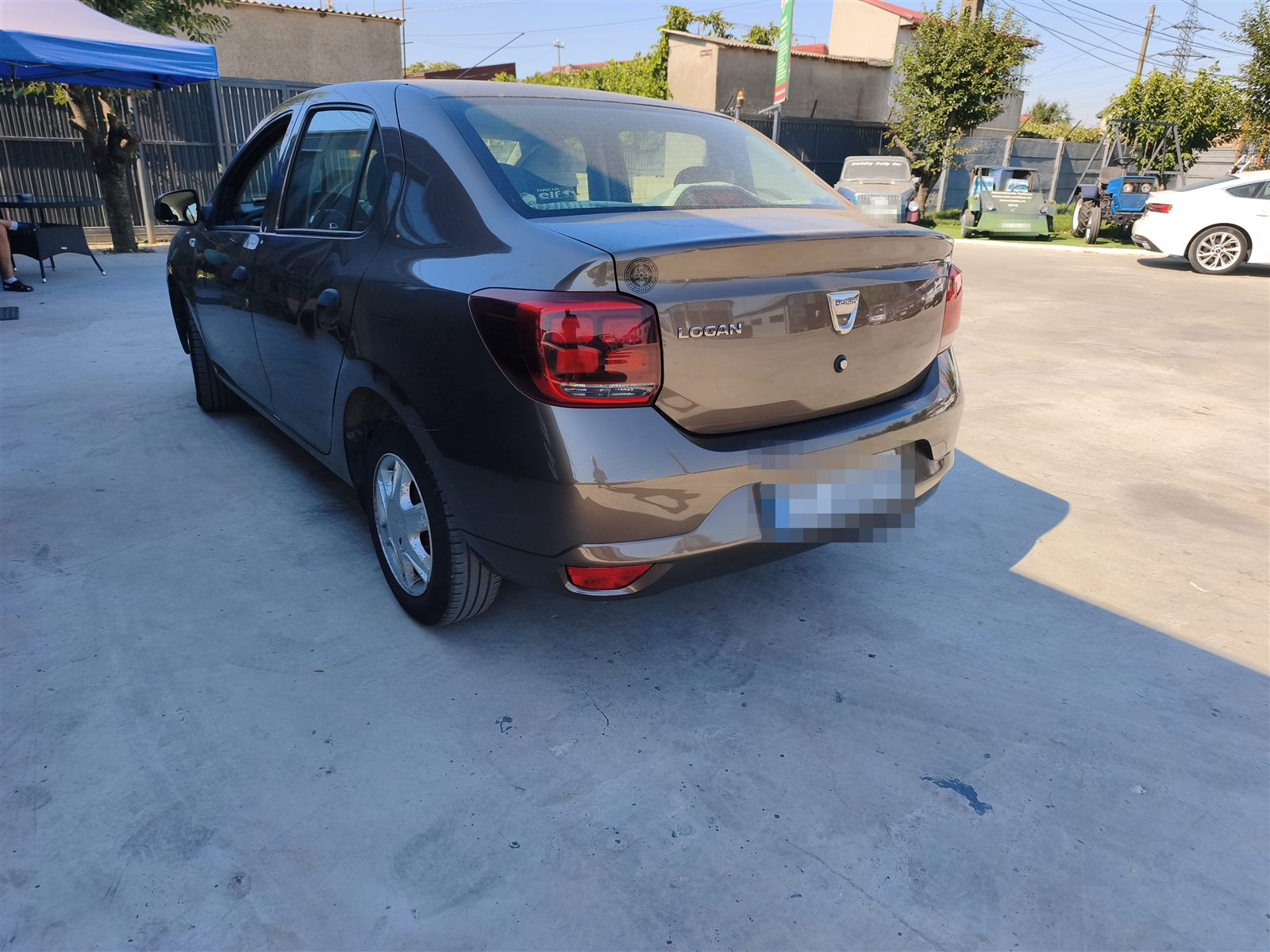 Dacia Logan — bară spate ruptă — după reparație